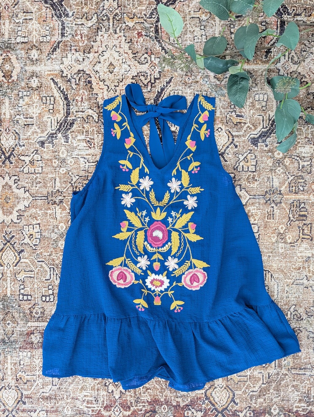 Entro bold floral sleeveless peplum blouse L